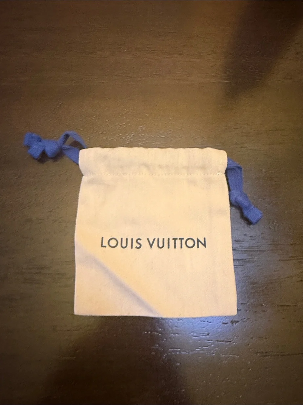 Louis Vuitton Small Beige Drawstring Pouch with Blue Ties